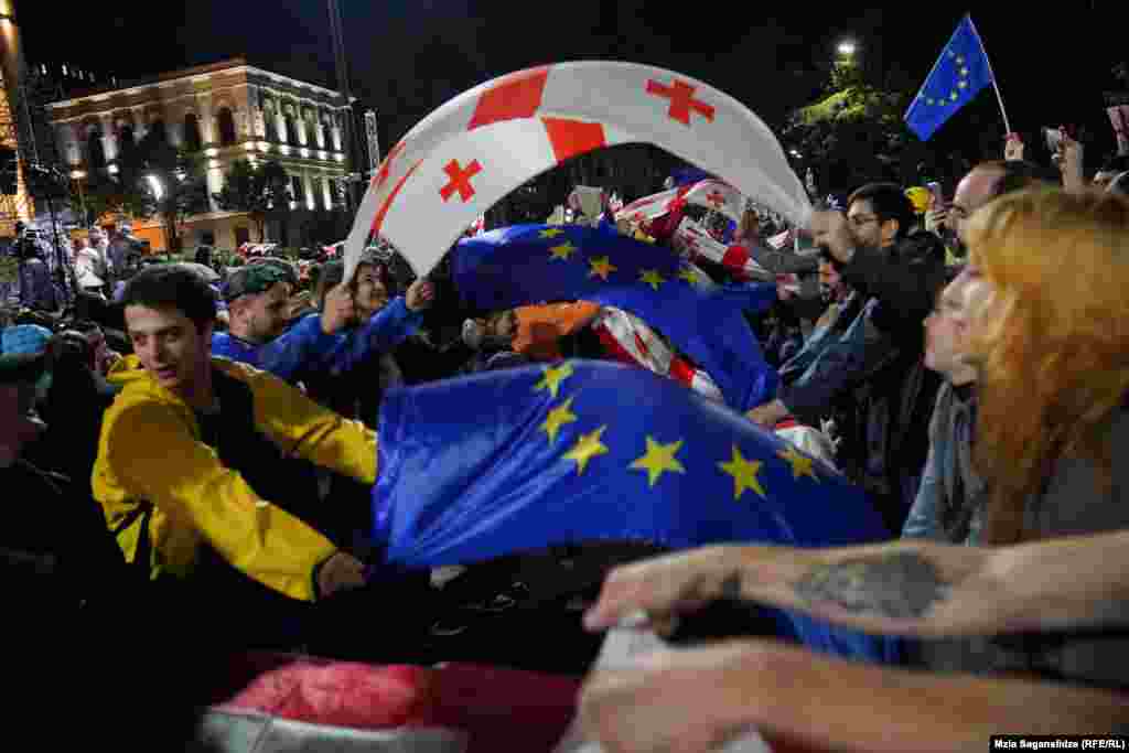 Protesters in the Georgia capital, Tbilisi, rally against the divisive &quot;foreign agent&quot; law, which was approved by parliament this week.&nbsp;