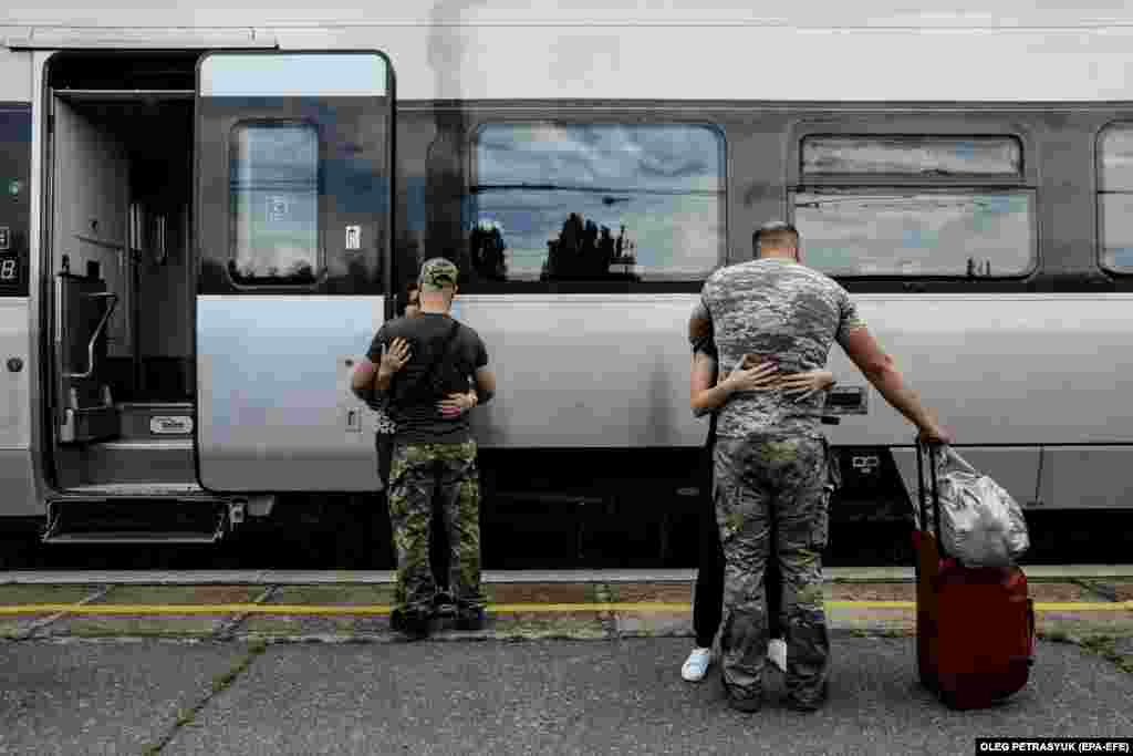 As some servicemen arrive, others must say goodbye as they return to war.