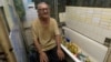 Viktor Grozdov, 77,&nbsp; sits in the bathroom of his damaged home on June 28 in the eastern Ukrainian town of Avdiyivka. The bathroom has become his refuge&nbsp;when the artillery shells rain down.<br />
<br />
A suburb of the city of Donetsk, Avdiyivka is shelled up to 30 times a day.&nbsp; &quot;In the last four months or so, there hasn&#39;t been a day without aerial or rocket strikes,&quot; the head of the military administration, Vitaliy Barabash, told AFP.