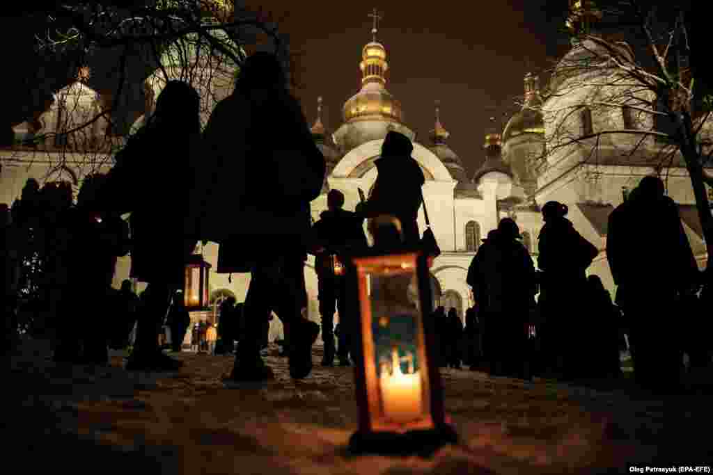 Crowds and a lantern outside the&nbsp;Saint Sophia Cathedral on December 10.&nbsp; Ukraine&#39;s Sophia of Kyiv National Reserve said in a Facebook post that the flame will be passed on to Ukrainian fighters at the front lines along with &quot;Christmas gifts as a thank you to the military and volunteers.&quot; &nbsp;