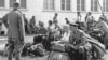 Чемоданное ожидание. На переднем плане - подполковник Николай Кондырев с супругой. Руггель, 9 мая 1945. (Госуд. архив Лихтенштейна)
