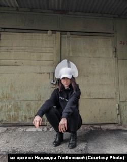 Glebovskaya models a headdress she made that blends traditional Russian folk dress and urban culture.