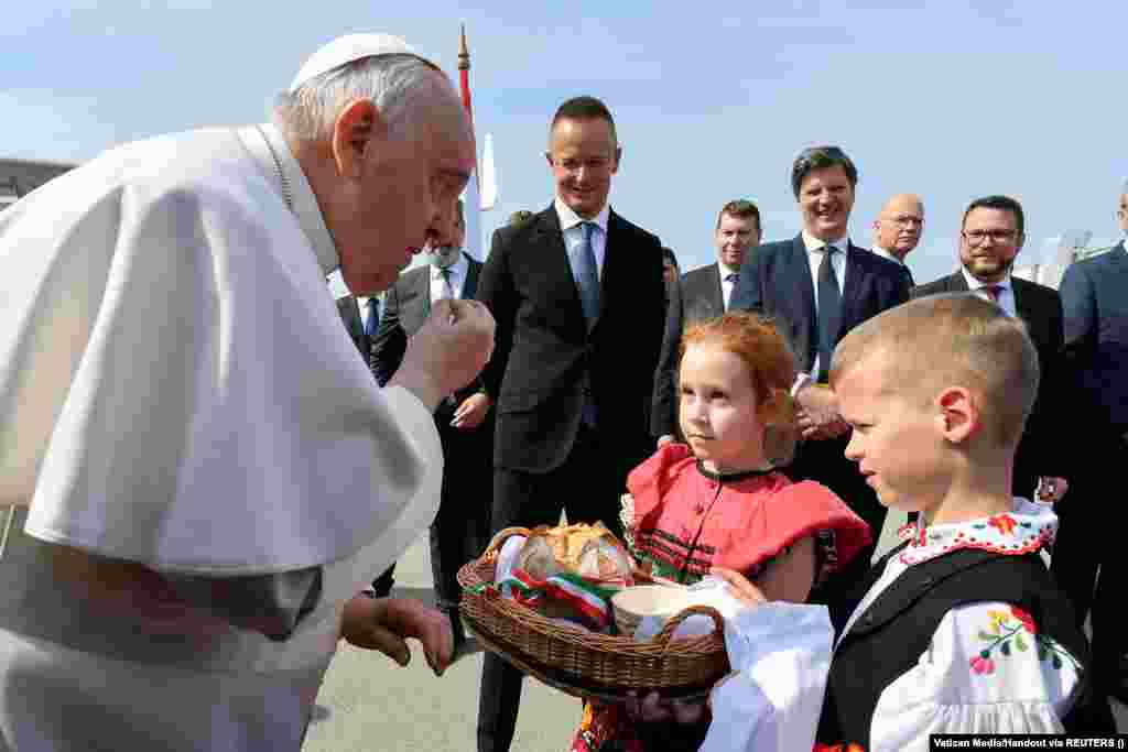 Pope Francis is greeted as he arrives at Budapest&#39;s Liszt Ferenc International Airport on April 28. In a speech, the pope warned of the dangers of rising nationalism in Europe and told the Hungarian government that accepting migrants along with the rest of the continent would be a true sign of Christianity.&nbsp;