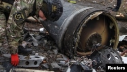  Снимка с част от хипотетичната севернокорейска ракета, показана от прокуратурата в Харков. 