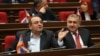 Armenia - Dashnaktsutyun leader Artsvik Minasian (left) attends a session of parliament, December 5, 2023.
