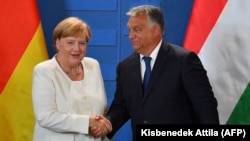 Angela Merkel német kancellár és Orbán Viktor magyar miniszterelnök a Páneurópai Piknik 30. évfordulóján Sopronban, 2019. augusztus 19-én