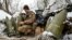 UKRAINE-CRISIS/FRONTLINE-ARTILLERY