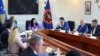 Kosovar President Vjosa Osmani leads a meeting on finding a date for parliamentary elections on July 30.