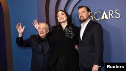  Мартин Скорсезе, Лили Гладстоун и Леонардо ди Каприо 