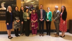 Tom West (center), the former U.S. special representative for Afghanistan, poses with Malala Yousofzai (center) in Washington. (file photo)