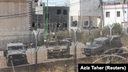 Израильские военные машины возле ливано-израильской границы, южный Ливан, 12 июля 2023 года