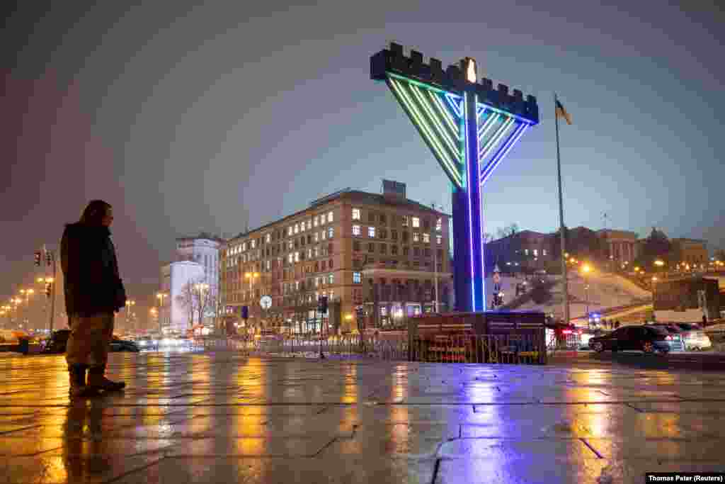 A menorah is illuminated to mark the Jewish festival of Hanukkah on Kyiv&#39;s Independence Square on December 7.