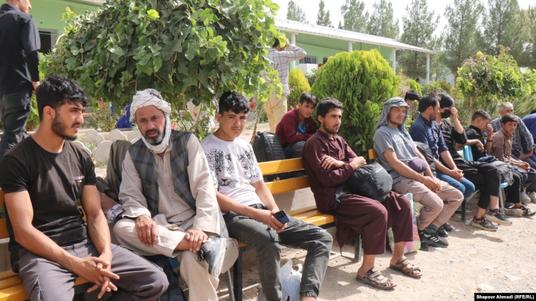 Afghans who were deported from Iran are seen in Afghanistan's western province of Herat.