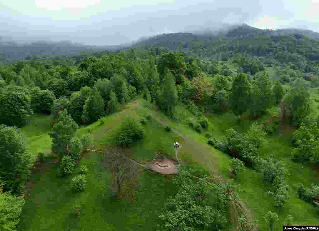 An aerial view of the natural gas fires (in a dirt patch in center of image) near Turca Zota says along with several known fires in this region of Romania, more exist that locals keep to themselves. &quot;The small fires appear and disappear according to the seismic activity in the area,&rdquo; the historian told RFE/RL.