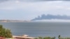 Smoke rises over the Kerch Strait from a fire in the Russian port of Kavkaz after a Russian fuel ferry was hit in a missile strike on August 22. 