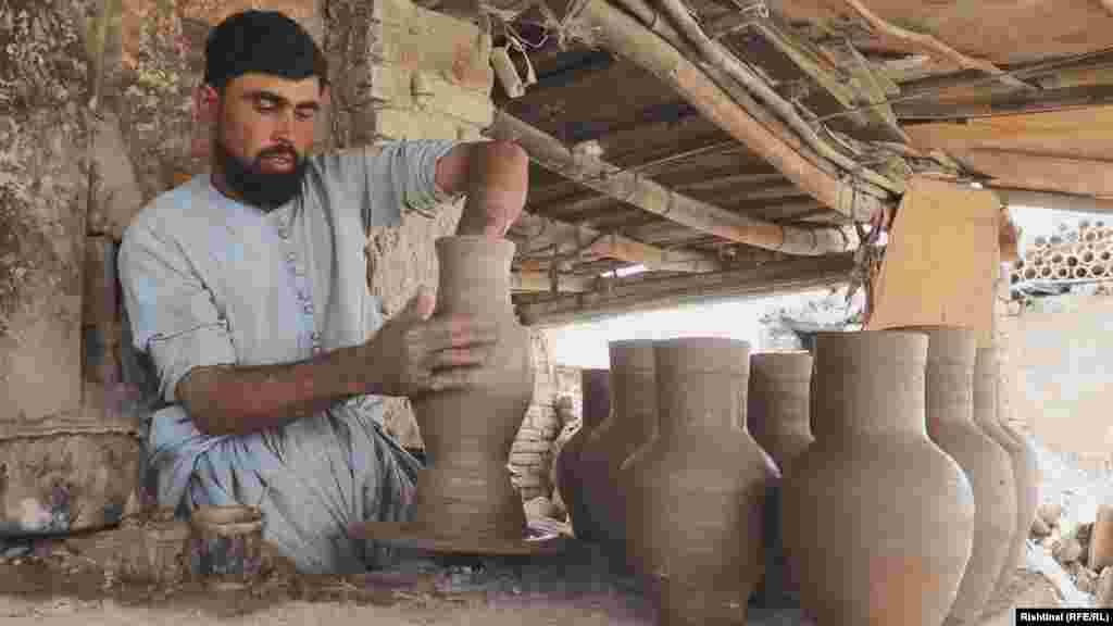 Potters then shape the clay with the help of a pottery wheel. Once the desired form is achieved, the clay will be left to dry while still being malleable enough for further treatment.