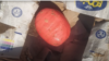 Казакстандын полициясы тараткан видеодон алынган сүрөт. Дамир Шайдинов ташып бараткан жүктөгү дарбыздын ичинен чыккан маңзат. 