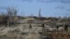 Ukrainian soldiers take part in a military training exercise in the Donetsk region on November 28. 