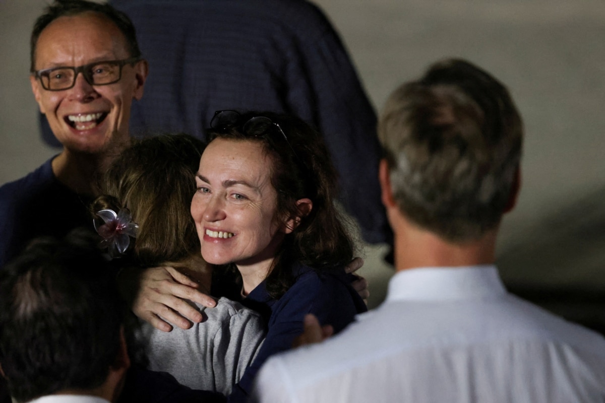 Alsu Kurmasheva is greeted by family at Joint Base Andrews in Maryland, US, August 2, 2024