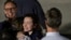 RFE/RL journalist Alsu Kurmasheva is reunited with her family at Joint Base Andrews, outside of Washington, D.C., on August 1. 