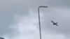 Момент удара беспилотника, скриншот с видео, иллюстративное изображение.