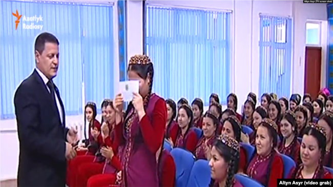 Traditionally, Turkmen who receive a cash gift from the president put it on their faces as a token of gratitude.