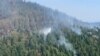 Ponijeri, Kakanj, Bosnia-Herzegovina, Extinguishing a wildfire from a helicopter on the Ponijeri mountain in central Bosnia. August 16, 2024. 