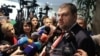 Delyan Peevski, an oligarch sanctioned by the United States, addresses reporters outside Bulgarian parliament in Sofia on November 9. 