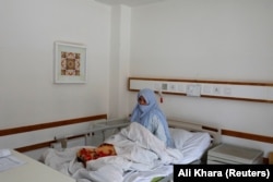 A woman in a maternity ward in Bamiyan.