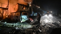 The aftermath of a Russian drone strike in Kharkiv, Ukraine