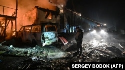 The aftermath of a Russian drone strike in Kharkiv, Ukraine