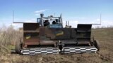 A Remote-Controlled Armored Tractor Hits The Mine-Strewn Fields Of Ukraine 1