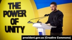 Ukrainian President Volodymyr Zelenskiy delivers a speech at the United24 summit in Kyiv on May 5. He later declared May 8 a day "of a united Europe, the basis of which should be and will be peace." 