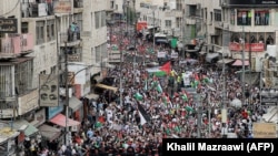 Митинг солидарности с палестинцами сектора Газа в столице Иордании Аммане. 27 октября 2023 года