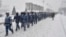 Russian National Guard soldiers walk in Moscow on December 4. 