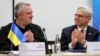 Ukrainian Prosecutor-General Andriy Kostin (left) and U.S. Attorney General Merrick Garland in Lviv on March 3.
