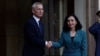 NATO Secretary-General Jens Stoltenberg (left) meets with Kosovar President Vjosa Osmani in Pristina on November 20.