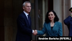 NATO Secretary-General Jens Stoltenberg (left) meets with Kosovar President Vjosa Osmani in Pristina on November 20.