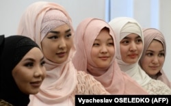 Kyrgyz women take part in celebrations for World Hijab Day in Bishkek. The hijab would not be affected by the proposed law. (file photo)