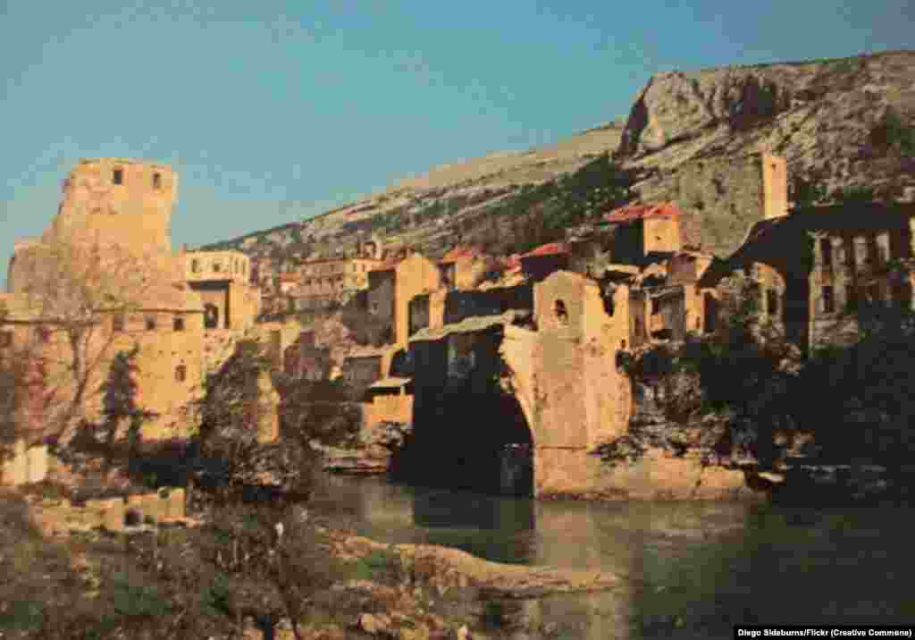 The remains of the bridge photographed soon after its destruction. Palata later recalled filming the surreal moment of the bridge&rsquo;s collapse. &quot;When you&#39;re looking through the viewfinder of the camera, everything is in black and white,&quot; he told a journalist. &quot;It feels like a dream and you think, &#39;If I move my eye away from the camera the bridge will still be standing there.&#39;&quot; &nbsp;