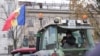 Moldova, Man in tractor in Chisinau during farmers protest