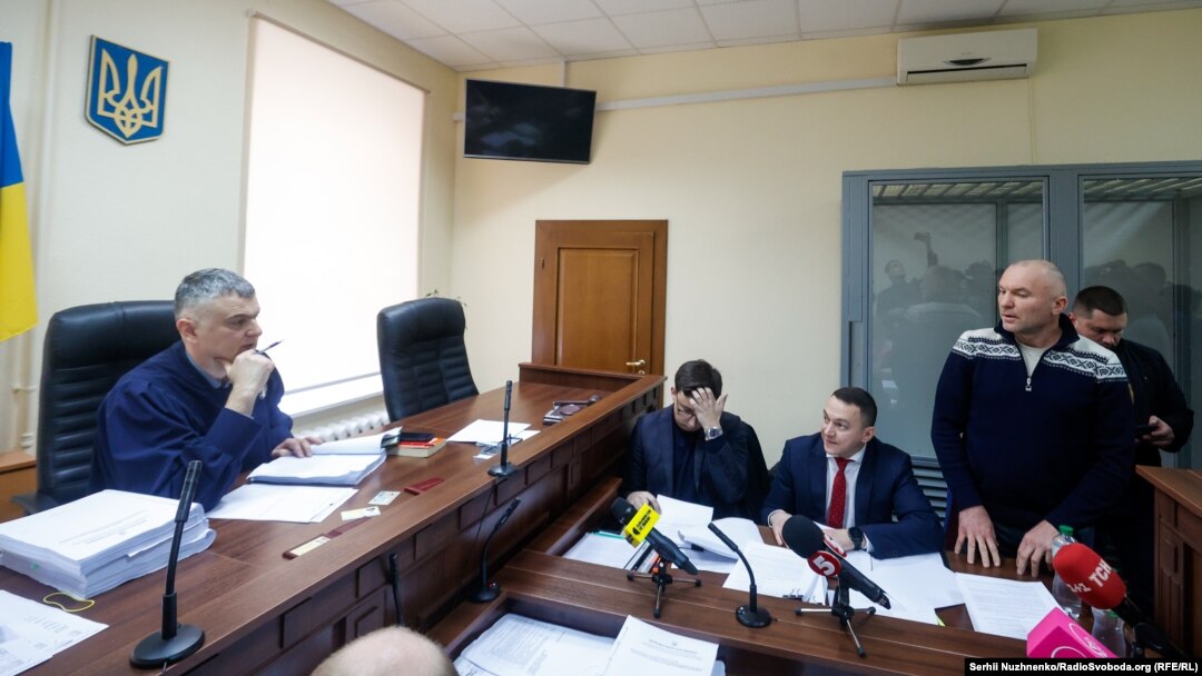 Mazepa (right) is accused of establishing a criminal group that illegally privatized 2.4 hectares of land located 12 kilometers outside Kyiv on a scenic stretch of the Dnieper River.