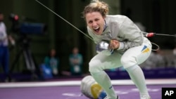 Ukraine's Olha Kharlan reacts after winning the women's team saber quarterfinal match against Italy during the 2024 Paris Olympics at the Grand Palais on August 3.