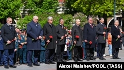 Left to right: Armenian Prime Minister Nikol Pashinian, Belarusian President Alyaksandr Lukashenka, Kazakh President Qasym-Zhomart Toqaev, Kyrgyz President Sadyr Japarov, Russian President Vladimir Putin, Tajik President Emomali Rahmon, Turkmen President Serdar Berdymukhamedov, and Uzbek President Shavkat Mirziyoev lay flowers at the Tomb of the Unknown Soldier on Victory Day in Moscow on May 9.