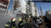 Rescuers work at the site of a residential building heavily damaged by a Russian missile strike in the city of Uman, Cherkasy region, Ukraine, on April 28.