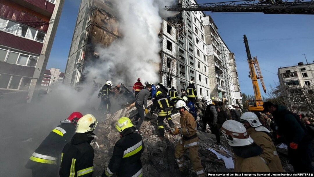 Rescuers work at the site of a residential building heavily damaged by a Russian missile strike in the city of Uman, Cherkasy region, Ukraine, on April 28.