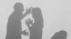 GENERIC -- Silhouettes of quarreling parents and little child on white background. Domestic violence concept