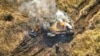 Российский танк горит в Донецке. Архивное фото