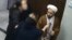ویدئویی که روز شنبه در شبکه‌های اجتماعی منتشر شد، نشان می‌داد یک فرد معمم در یک مرکز درمانی از یک مادر که بدون حجاب اجباری کودکش را در آغوش گرفته فیلمبرداری می‌کند