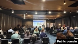 Armenia - Government officials, scientists and reporters watch a live broadcast of the launch of a first Armenian-made satellite into space, Yerevan, December 1, 2023.